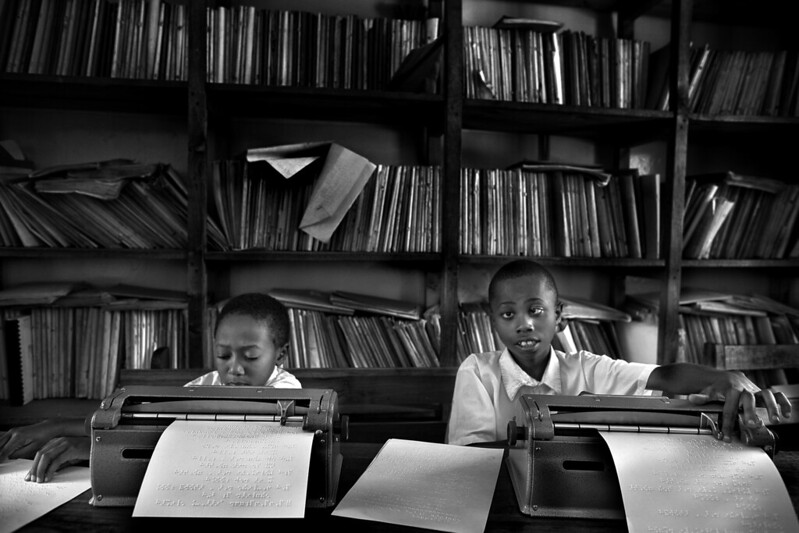 Students at a school for the visually impaired in Tanzania working on their Braille Typewriters