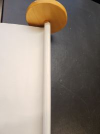 Scroll's end, adhesive on dowel