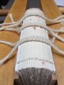 Text block is sewn onto linen cords and warm gelatin is applied to the spine.