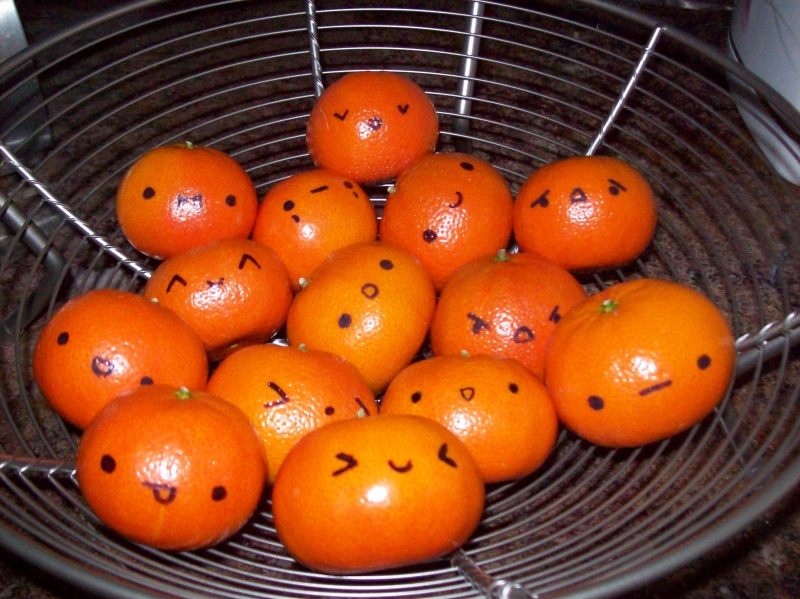 File:Oranges with faces.jpeg
