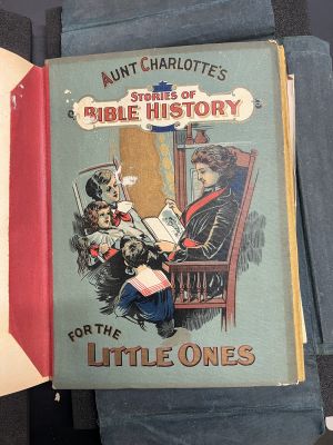 Lithograph cover from Aunt Charlotte's Stories of Bible History for Young Disciples